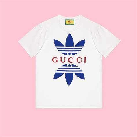 is adidas and gucci the same company|Gucci Adidas t shirts.